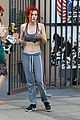 bella thorne shows off new bright red and yellow hair color at the gym 09