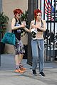 bella thorne shows off new bright red and yellow hair color at the gym 12