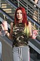 bella thorne shows off new bright red and yellow hair color at the gym 15