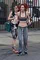 bella thorne shows off new bright red and yellow hair color at the gym 22