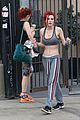 bella thorne shows off new bright red and yellow hair color at the gym 24