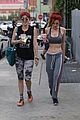 bella thorne shows off new bright red and yellow hair color at the gym 26