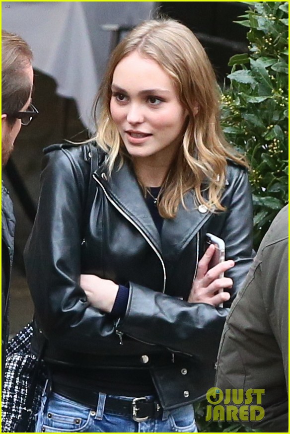lily rose depp keeps good luck charms in her purse 04