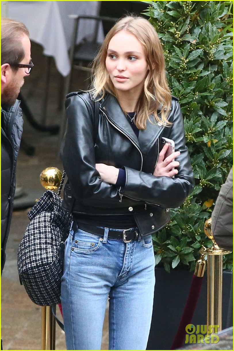 lily rose depp keeps good luck charms in her purse 12