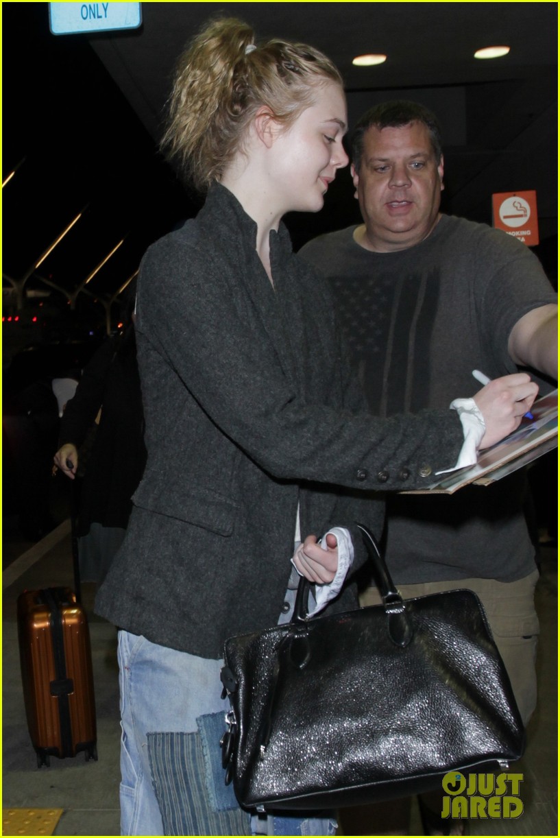 elle fanning super busy new film lax arrival pics 05