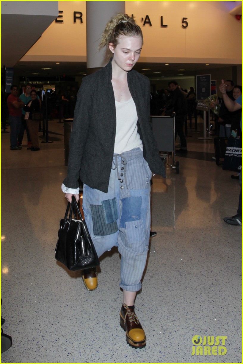 elle fanning super busy new film lax arrival pics 06
