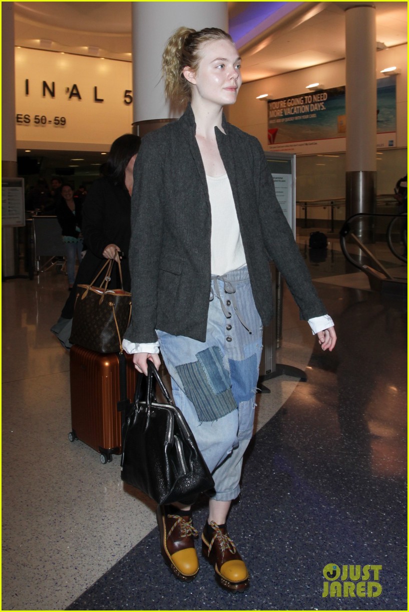 elle fanning super busy new film lax arrival pics 07
