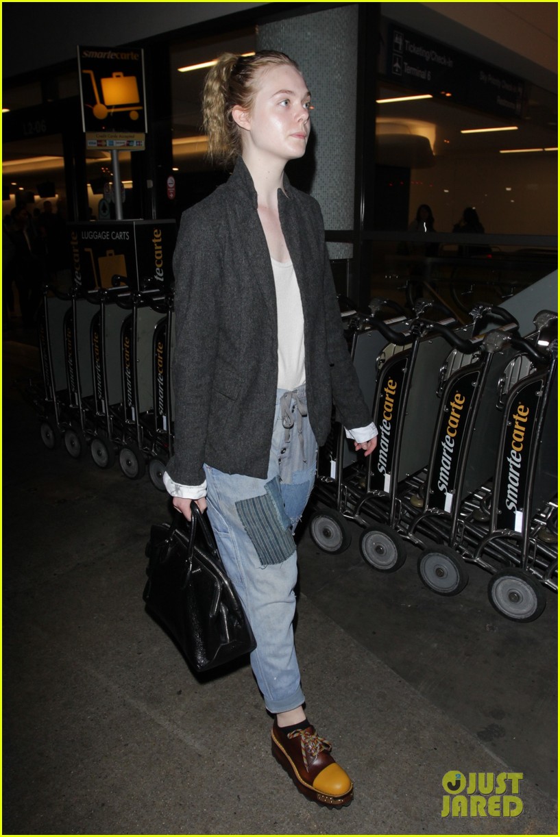 elle fanning super busy new film lax arrival pics 11