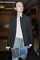 elle fanning super busy new film lax arrival pics 02