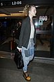 elle fanning super busy new film lax arrival pics 03