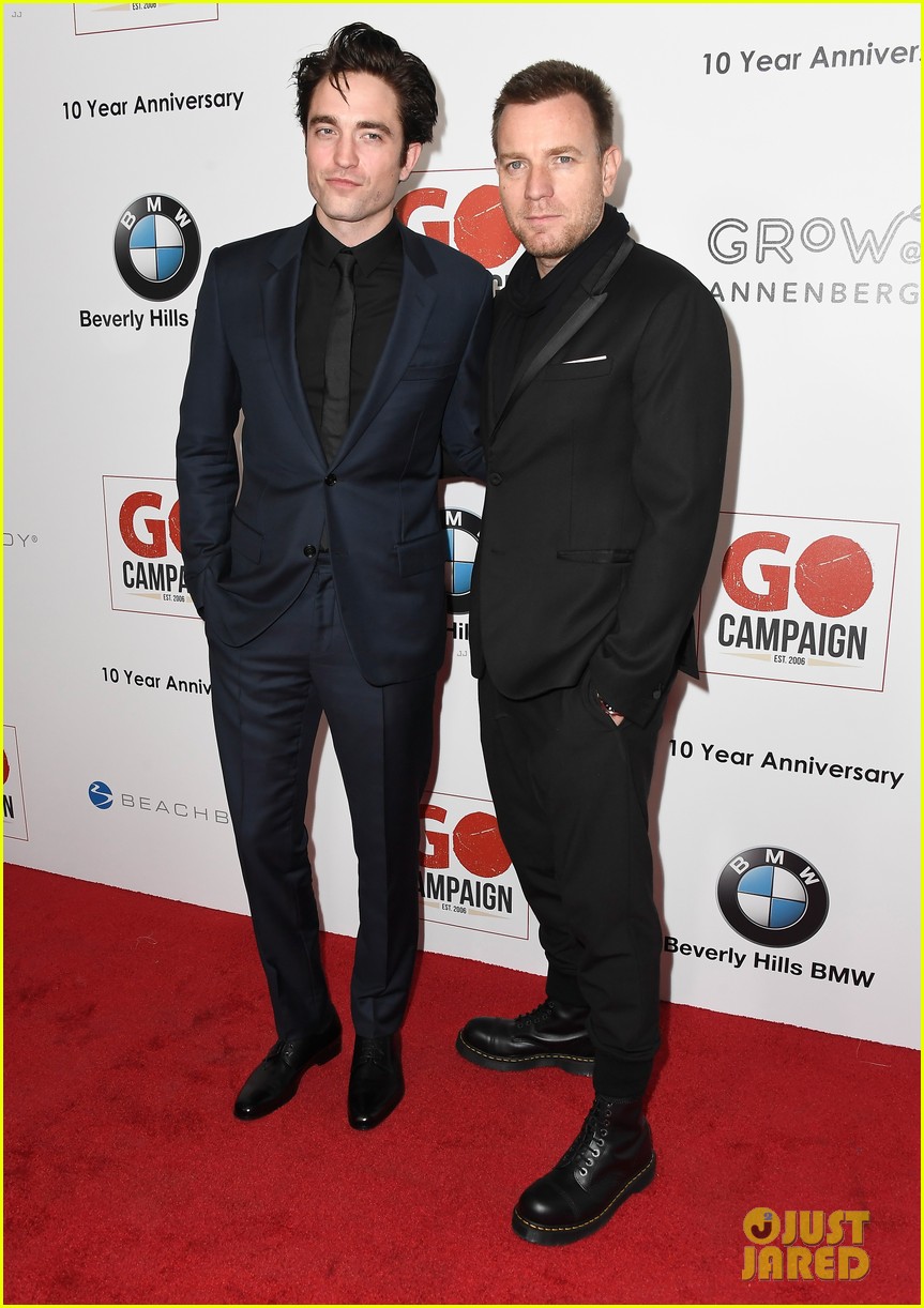 liam hemsworth robert pattinson and lily collins look sharp at go campaign gala 10