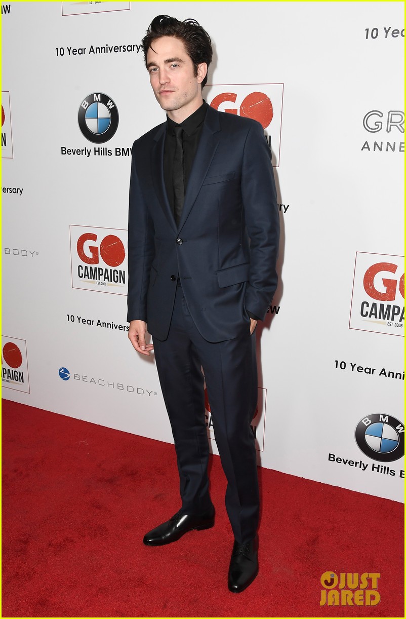 liam hemsworth robert pattinson and lily collins look sharp at go campaign gala 15