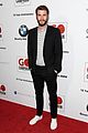 liam hemsworth robert pattinson and lily collins look sharp at go campaign gala 07