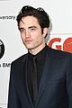 liam hemsworth robert pattinson and lily collins look sharp at go campaign gala 11