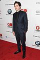 liam hemsworth robert pattinson and lily collins look sharp at go campaign gala 15