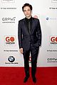 liam hemsworth robert pattinson and lily collins look sharp at go campaign gala 16