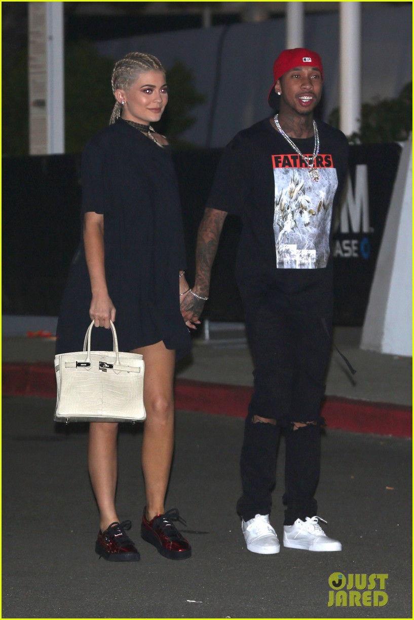 kylie jenner couples up with tyga at kanye west concert 01