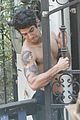 tyler posey goes shirtless as he works on his motorcycle 04