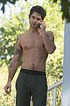 tyler posey goes shirtless as he works on his motorcycle 05