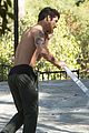 tyler posey goes shirtless as he works on his motorcycle 06