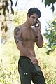 tyler posey goes shirtless as he works on his motorcycle 10