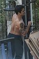 tyler posey goes shirtless as he works on his motorcycle 12