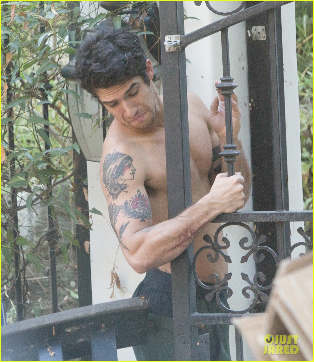 tyler posey goes shirtless as he works on his motorcycle 04
