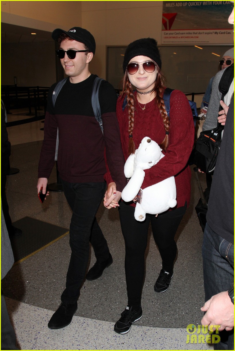 meghan trainor and daryl sabara hold hands while departing lax 01