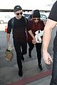 meghan trainor and daryl sabara hold hands while departing lax 04