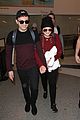 meghan trainor and daryl sabara hold hands while departing lax 08