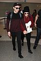meghan trainor and daryl sabara hold hands while departing lax 09