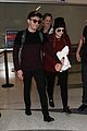 meghan trainor and daryl sabara hold hands while departing lax 13