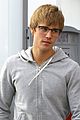 justin bieber gives the camera a swooning stare behind his glasses 05
