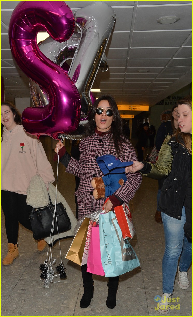 camila cabello bear balloons heathrow airport 05
