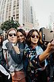miley cyrus gina rodriguez and barbra streisand stand together at womens march 06