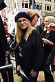 miley cyrus gina rodriguez and barbra streisand stand together at womens march 08