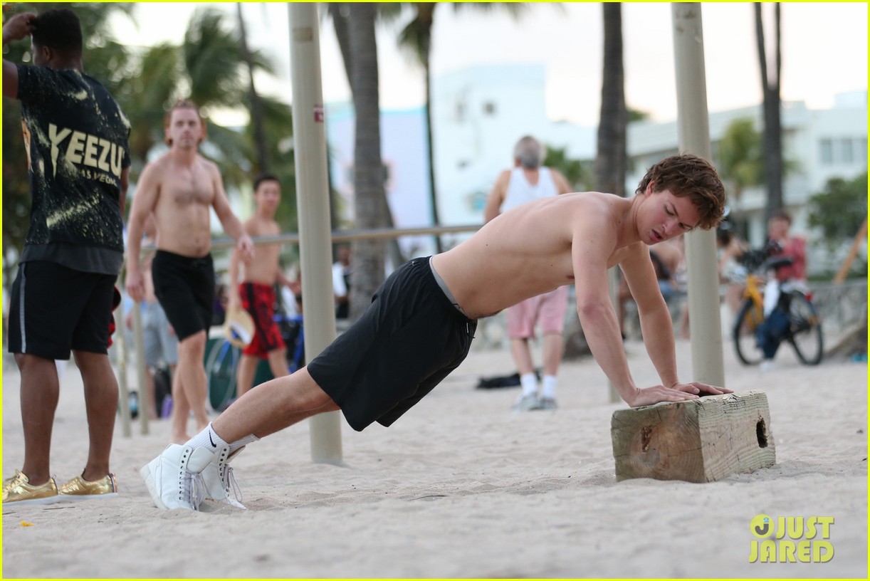 ansel elgort goes shirtless for a workout at the beach 04