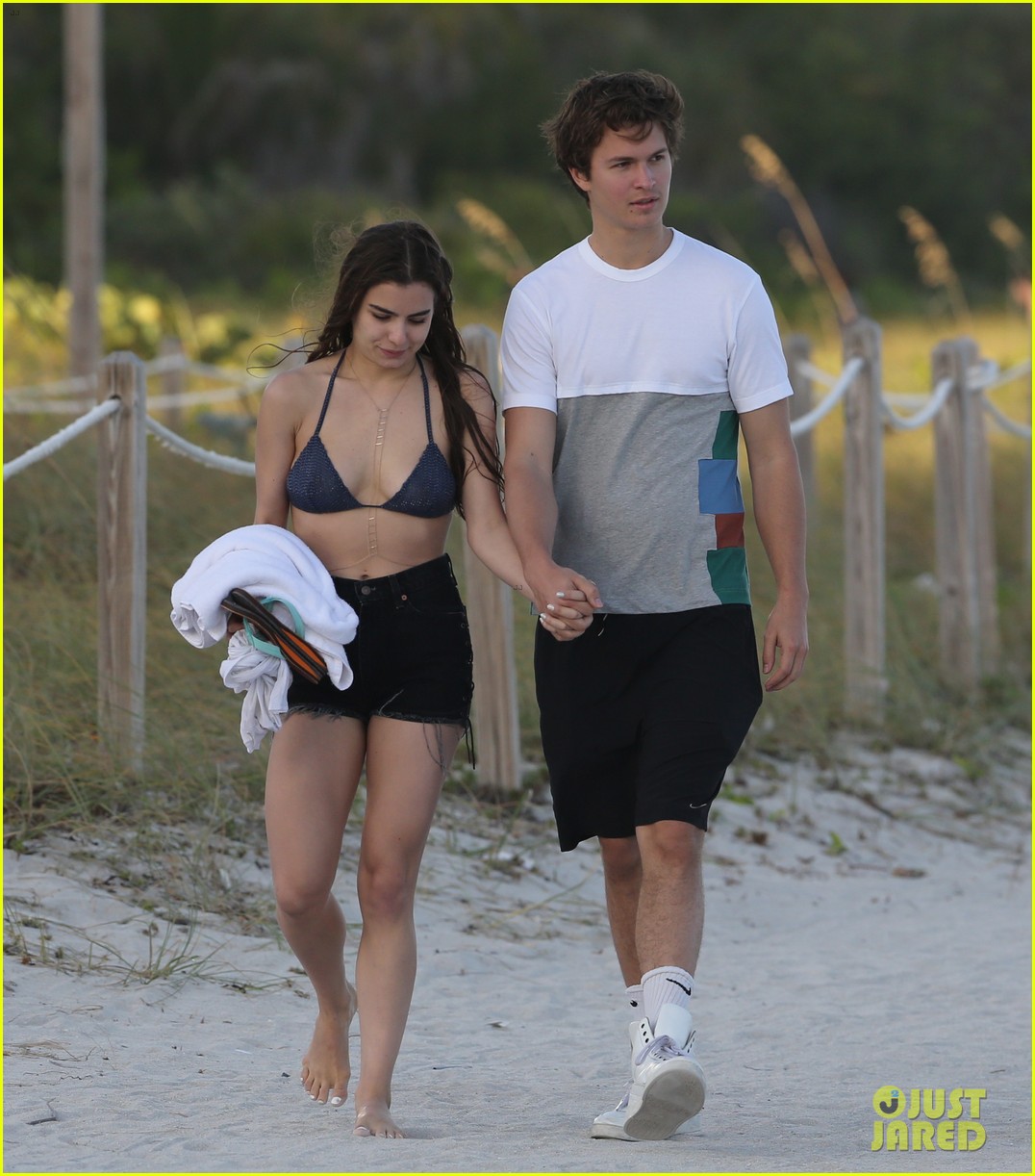 ansel elgort goes shirtless for a workout at the beach 16