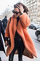 bella hadid runs into photo of herself on the street in paris 03