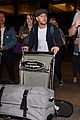 niall horan arrives lax airport fans 01