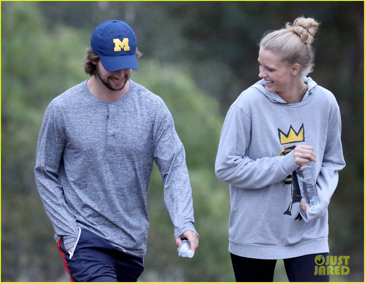 patrick schwarzenegger and abby champion cuddle on the beach together 01