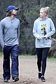 patrick schwarzenegger and abby champion cuddle on the beach together 07