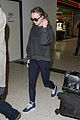 lily rose depp keeps a low profile arriving at lax 01