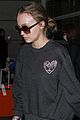 lily rose depp keeps a low profile arriving at lax 02