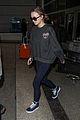 lily rose depp keeps a low profile arriving at lax 03
