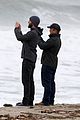 liam hemsworth and brother luke check out surf after socal storm 02