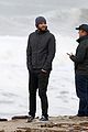 liam hemsworth and brother luke check out surf after socal storm 05