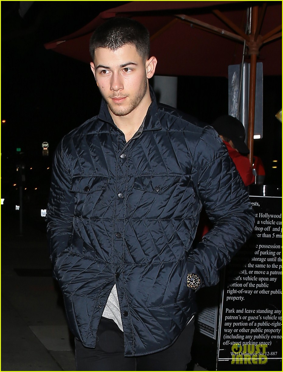 nick jonas goes out to dinner after night out with female friend 03