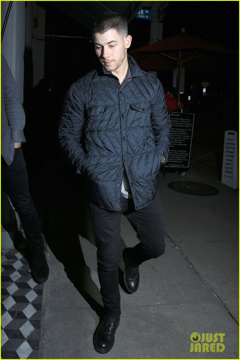 nick jonas goes out to dinner after night out with female friend 06