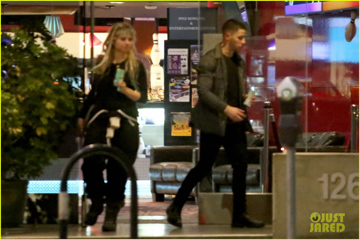 nick jonas steps out with mystery blonde 02